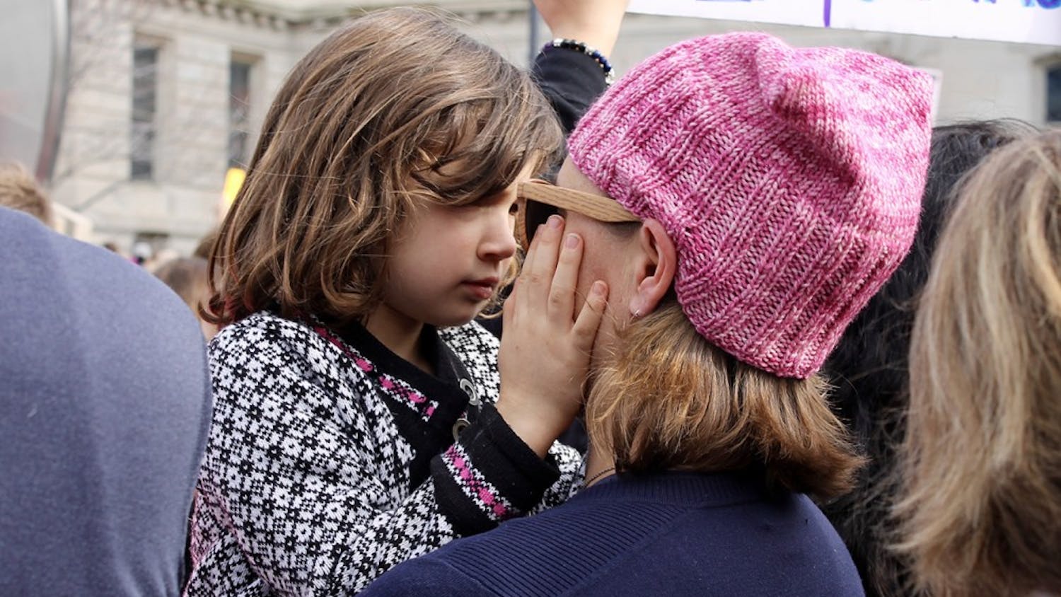 A mother and daughter embrace&nbsp;during the Women's March in Indianapolis on Saturday.