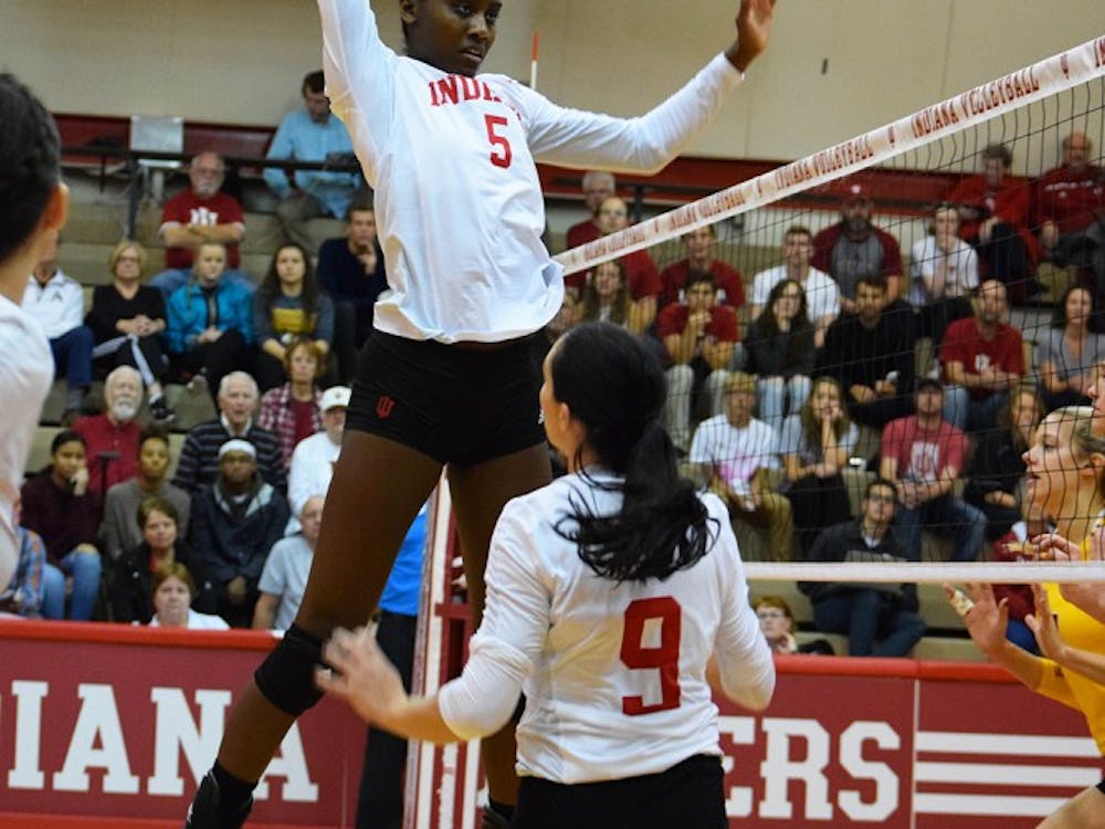 Senior middle blocker Jazzmine McDonald fakes-out the opponents by pretending to go up for a kill against Minnesota on Friday, Sept. 30, 2016. McDonald was selected to play on Team USA for the World University Games in August.