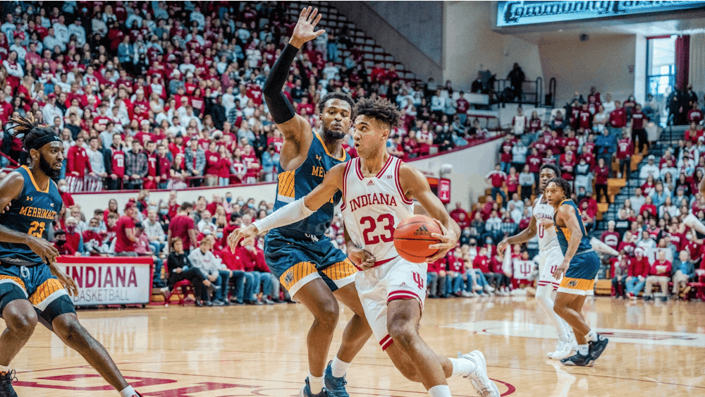 Indiana junior forward Trayce Jackson-Davis drives to the basket Dec. 12, 2021, at Simon Skjodt Assembly Hall. Indiana men&#x27;s basketball&#x27;s game Wednesday was canceled due to COVID-19 issues within the University of North Carolina at Asheville&#x27;s program.