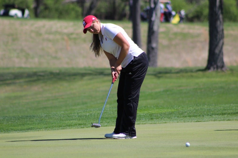 Sophomore Erin Harper putts during the first round of the IU Invitational at IU Golf Course on April 8, 2017. The 2017-18 IU Women's Golf schedule was released on Tuesday.