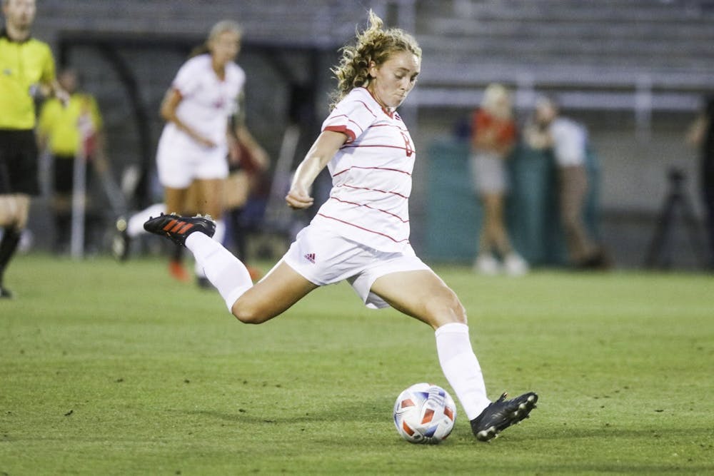 Junior midfielder Avery Lockwood strikes the ball Sept. 2, 2021, in Bill Armstrong Stadium. Indiana won its final non conference game of the season over Kansas State, 3-0.