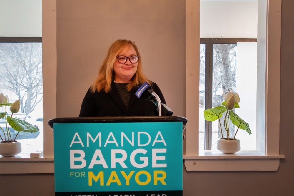 <p>Amanda Barge, then a 2019 Bloomington mayoral candidate, speaks at a press conference Feb. 22 at her campaign headquarters. Barge announced Monday she would be resigning as a Monroe County commissioner following sexual harassment allegations.</p>