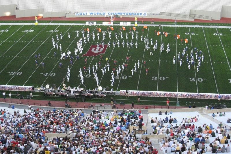 The Blue Stars Drum and Bugle Corps perform their show "Le Tour...Every Second Counts" during DCI Quarterfinals Thursday evening at Memorial Stadium.