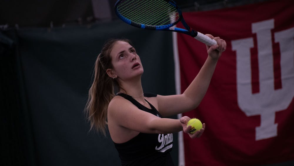 Redshirted junior Mila Mejic prepares the serve the ball February 26, 2023, in a singles match against Belmont at the IU Tennis Center in Bloomington, Indiana. Indiana beat Belmont and Western Michigan this weekend.