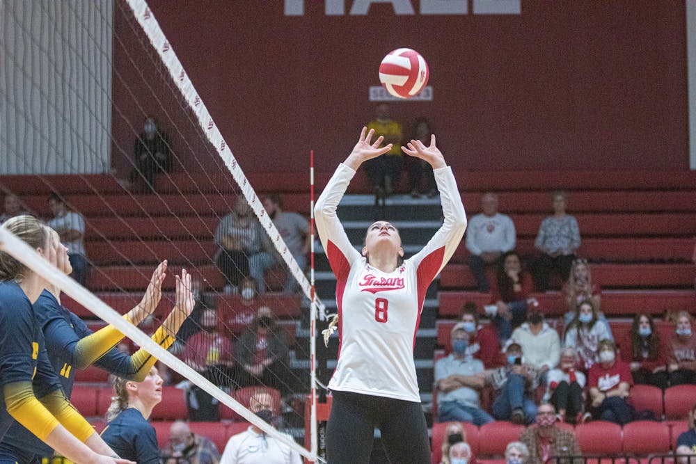 <p>Graduate setter Brooke Westbeld sets the ball against Michigan on Oct. 20, 2021, at Wilkinson Hall. Indiana lost to Michigan 3-0.</p>