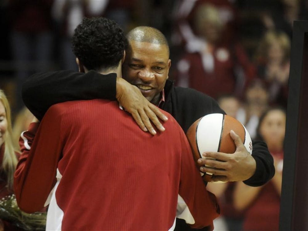 Senior guard Jeremiah Rivers hugs his father, Glenn "Doc" Rivers after Jeremiah's Senior Night speech Thursday at Assembly Hall. Rivers has scored 116 points and 30 steals this season, including his final regular-season home game for the Hoosiers.
