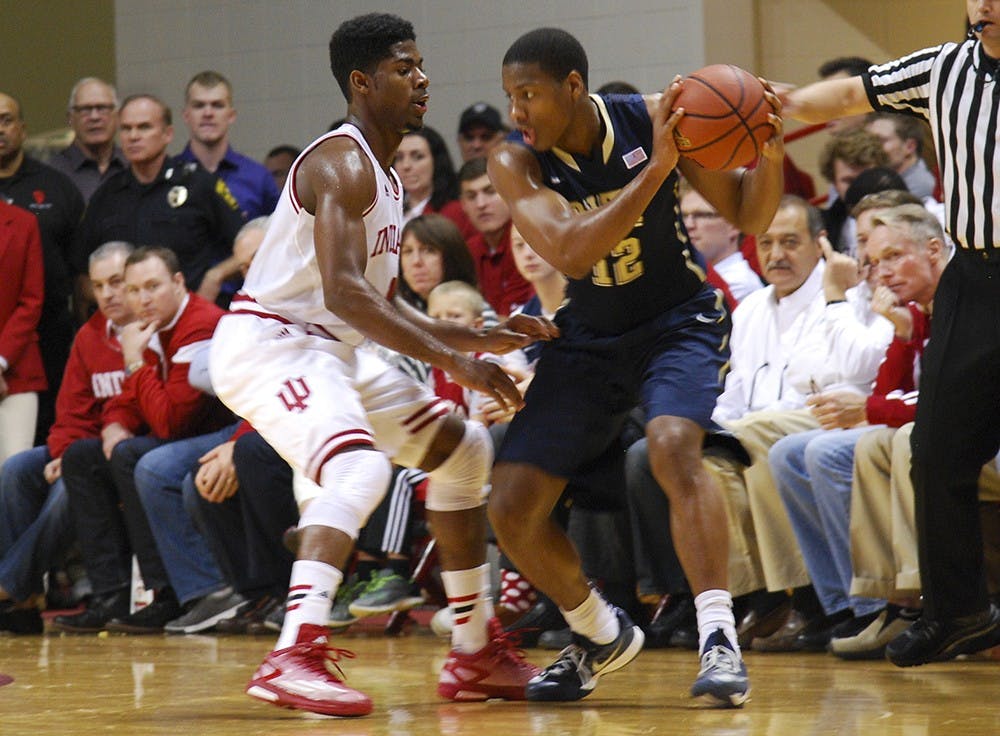 Freshman Rob Johnson defends his opponent during IU's game against Pittsburgh on Tuesday at Assembly Hall.