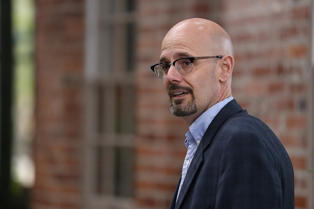 Mayoral candidate Daryl Neher speaks at a press conference in the City Hall atrium Monday evening. At the press conference, TKTKTKTK endorsed him publicly. 