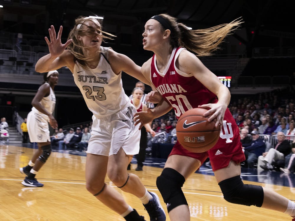 Senior Brenna Wise tries to get by a Butler University defender Dec. 11 at Hinkle Fieldhouse in Indianapolis. No. 12 IU beat Butler 64-53.