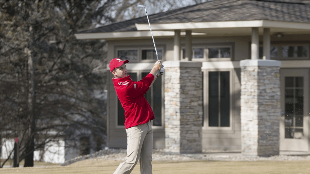 Then-freshman Evan Yakubov practices his iron shots during a practice at the IU Golf Course in Jan. 2018. The Hoosiers will compete in the Windon Memorial this weekend.