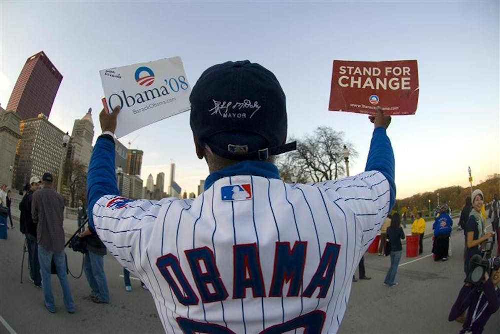 Barack Obama supporter and self proclaimed "number one Cubs fan" Ronnie "Woo-Woo" Wickens shouts out "Obama Woo" Tuesday afternoon outside Grant Park in Chicago, IL.