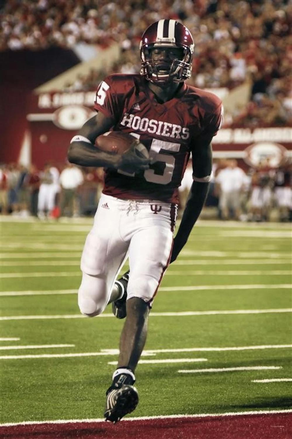 Quarterback Kellen Lewis scores a touchdown during the first half of the Hoosiers 42-20 loss to Ball State on Saturday night at Memorial Stadium.