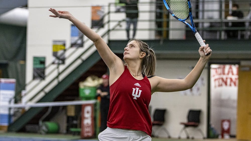 Junior Mila Mejic serves against Marquette on Feb. 6, 2022, at the IU Tennis Center. Mejic was one of two Indiana players to win their singles match in the team’s 5-2 loss to the College of Charleston on Friday.  