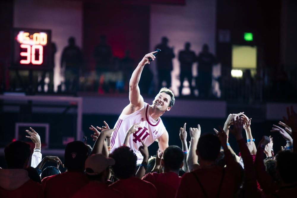 <p>Senior forward Nate Childress takes a selfie with fans during his introduction at Simon Skjodt Assembly Hall for Hoosier Hysteria on Oct. 7, 2022. Childress is one of four walk-ons on Indiana men&#x27;s basketball this season.</p>