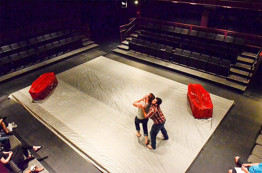 Zachary Spicer and Sam Barkley rehearse a fight call in the production "As You Like It" in the Wells Metz Theater on Sunday. Spicer plays Orlando and Barkley plays Charles and William in the production. 