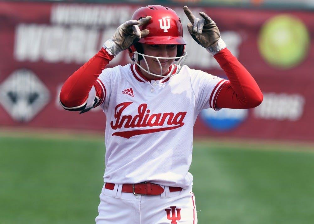 <p>Freshman outfielder Taylor Lambert celebrates after making a run against Nebraska on Sunday afternoon at Andy Mohr Field. IU lost to Nebraska, 2-1. The Hoosiers will play at home against Butler on Tuesday night.</p>