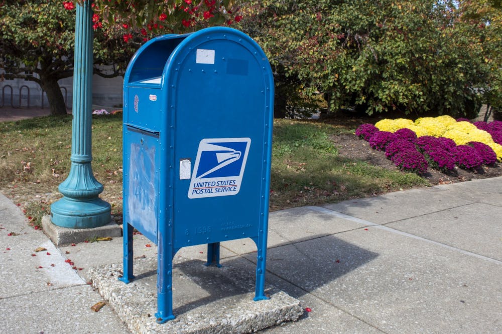 <p>A U.S. Postal Service collection box sits Oct. 11 near the Indiana Memorial Union. </p>