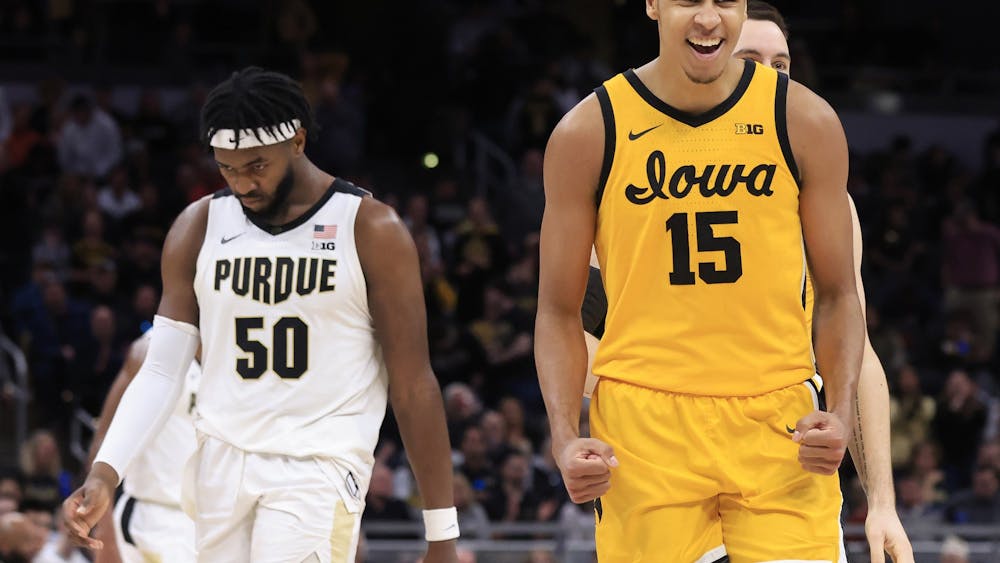 Then-Iowa sophomore forward Keegan Murray reacts after a play against Purdue during the Big Ten Championship on March 13, 2022, at Gainbridge Fieldhouse in Indianapolis.