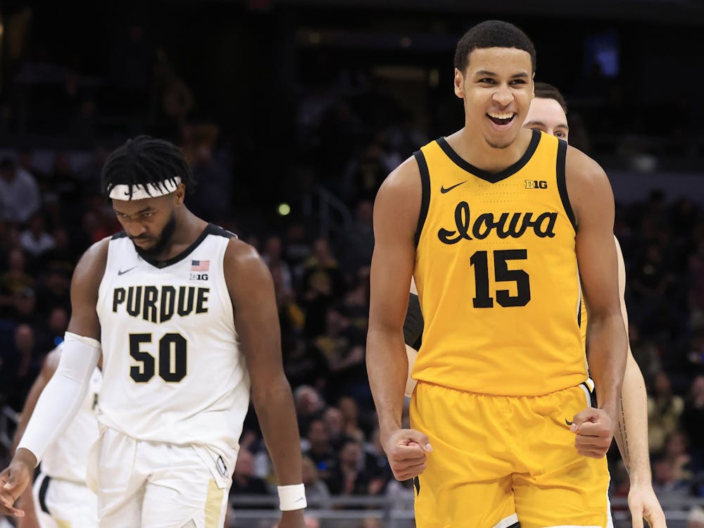 Then-Iowa sophomore forward Keegan Murray reacts after a play against Purdue during the Big Ten Championship on March 13, 2022, at Gainbridge Fieldhouse in Indianapolis.