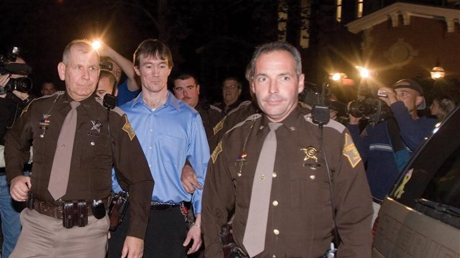 John R. Myers II is led out of the courthouse on Oct. 30, 2006 evening after being found guilty after a 50-minute deliberation by the jury. He will be sentenced by Superior Judge Christopher Burnham in the next 30 days.