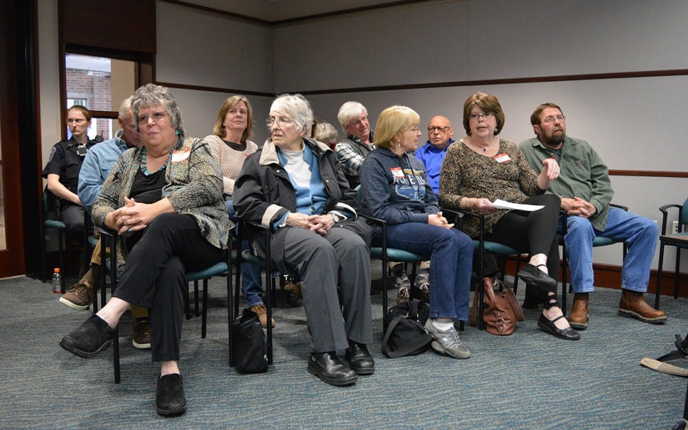 Residents of Edgewood Hills, part of the second annexation area, wait for the city council meeting to start Wednesday night. Many people who live outside city limits hope to stop the annexation.