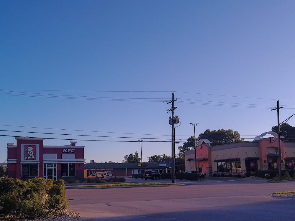 <p>KFC and Taco Bell are seen Aug. 30, 2023 on 3rd Street. The stores will be closing to make room for a new car wash.</p>