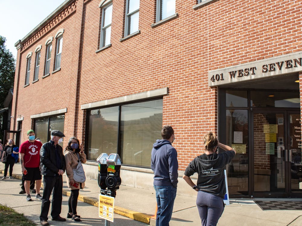 Voters wait in line to vote Oct. 6, 2020, at ﻿Election Central at 401 W. Seventh St. Monroe County will have 28 polling locations open from 6 a.m. to 6 p.m. Nov. 8.