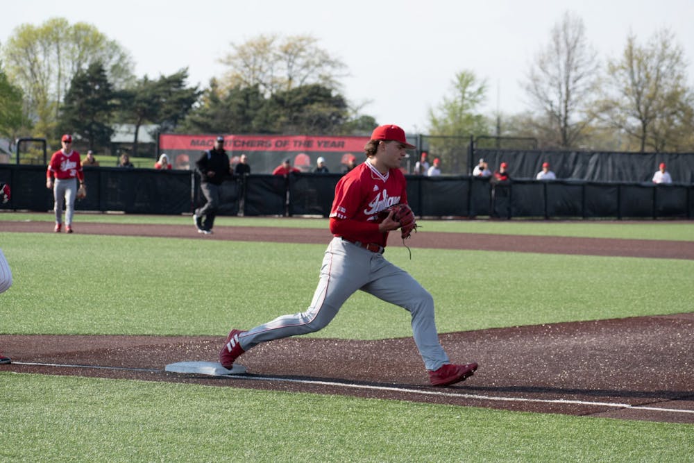 <p>Freshman right-handed pitcher Connor Foley gets an out at first April 25, 2023, ﻿against Ball State in Muncie, Indiana. The Hoosiers beat the Cardinals 9-8 on Tuesday.</p>