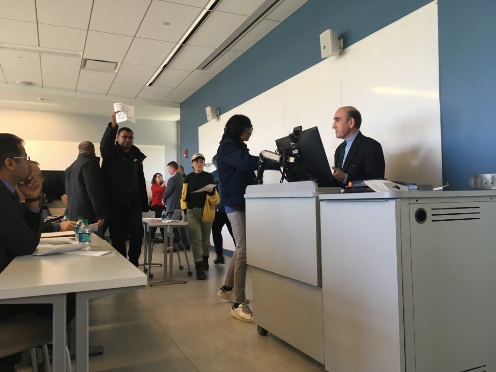 <p>Students drop fliers as they leave Elliott Abrams' speech. The event was organized March 2, 2018, and drew heavy controversy.</p>