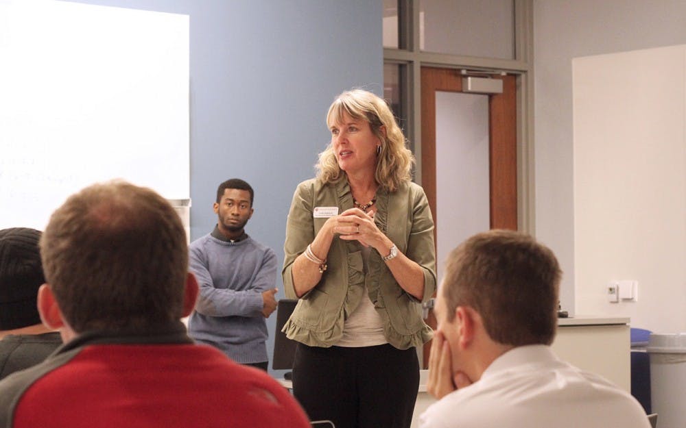 Lori Ressor, the Vice President of Student Affairs, gives a brief speech before the IUSA meeting begins on Tuesday.