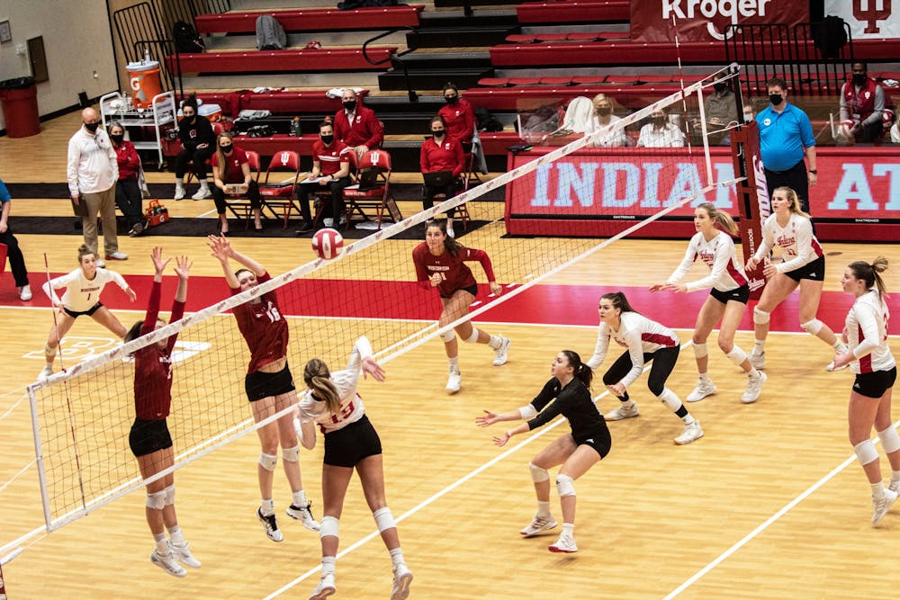 <p>Then-freshman outside hitter Ashley Zuluaf spikes the ball against Wisconsin on Feb. 13, 2021. IU will play against Wisconsin at 8 p.m. Oct. 5, 2022, in Wilkinson Hall.</p>