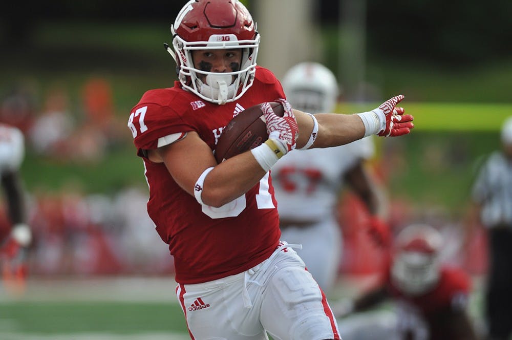 Senior wide receiver Mitchell Paige sprints along the sideline before being chased out of bounds on Saturday at Memorial Stadium. IU defeated Ball State 30-20.
