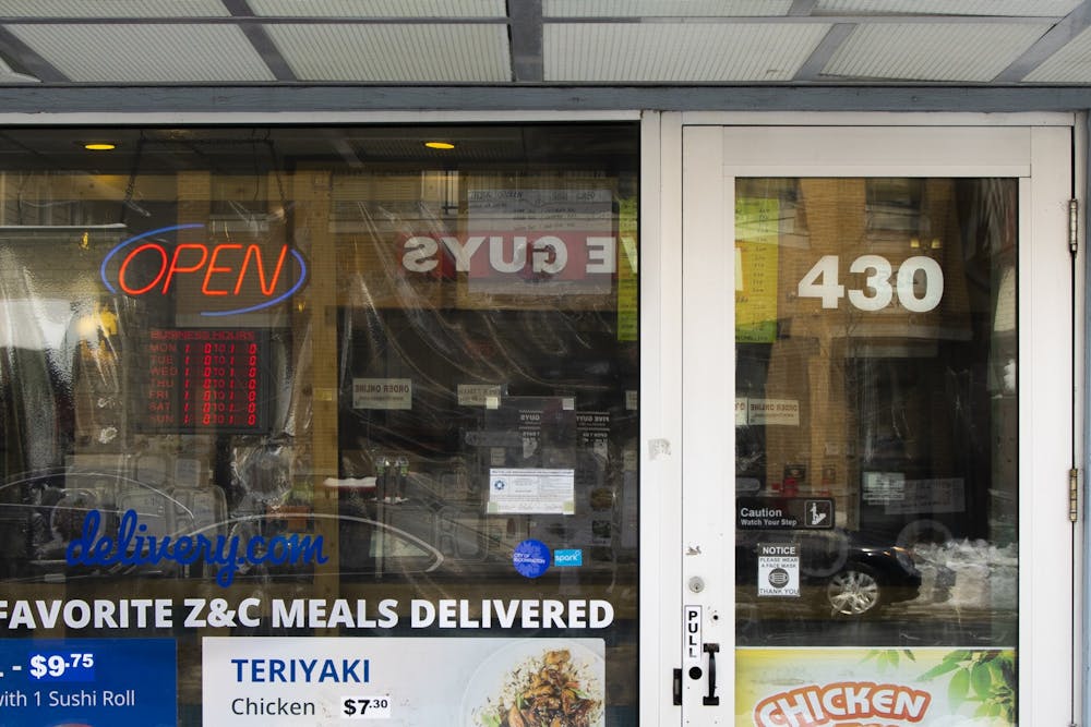 <p>An open sign is seen Wednesday in the storefront of Z&amp;C Teriyaki and Sushi Restaurant on Kirkwood Avenue. The Indiana State Senate passed a bill Feb. 8 that will allow small businesses to appeal to COVID-19 shutdowns. </p>
