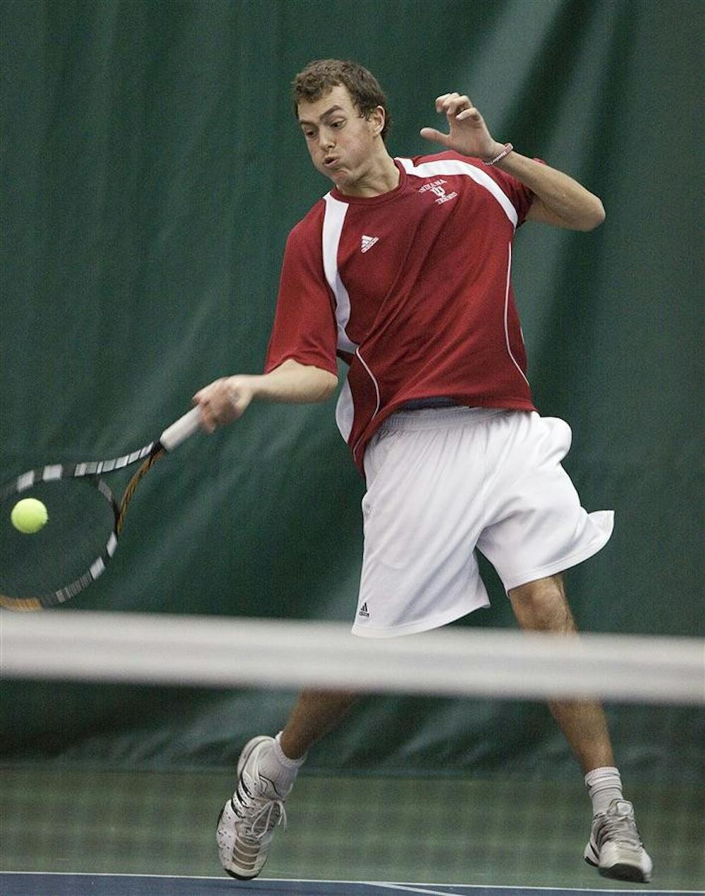 Sophomore Stephen Vogl returns a shot against Butler on Saturday at the IU Tennis Center.