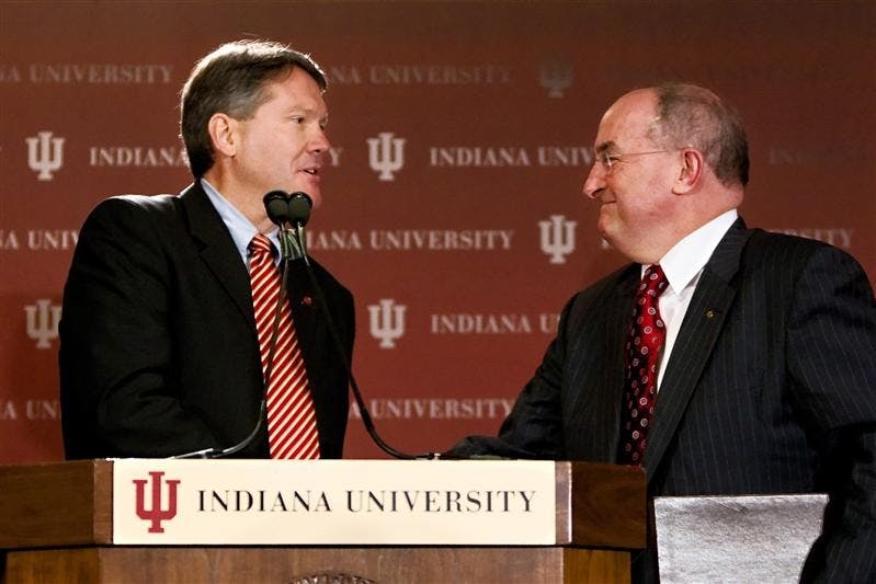 Indiana University president Michael McRobbie congratulates Fred Glass on being named IU's next director of intercollegiate athletics Tuesday morning at the DeVault Alumni Center. Glass '81 is an IU alumnus and most recently served as an Indianapolis attorney and civic leader. 