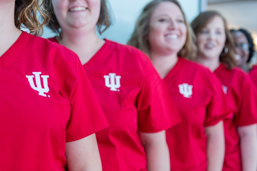 A group of IU nursing students stand for a photo. Indiana University School of Nursing at IUPUI plans to increase undergraduate student enrollment by 50%, thanks to a $16 million gift from Indiana University Health over the next three years. 