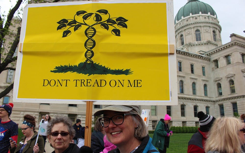 Tami Coleman, 54, came to join an estimated 10,000 people at the March for Science in Indianapolis from her hometown, Anderson, Indiana. Coleman said she’s a New Englander, and is sick of pepole co-opting New England symbols, like the Gasden flag, to further their causes. 