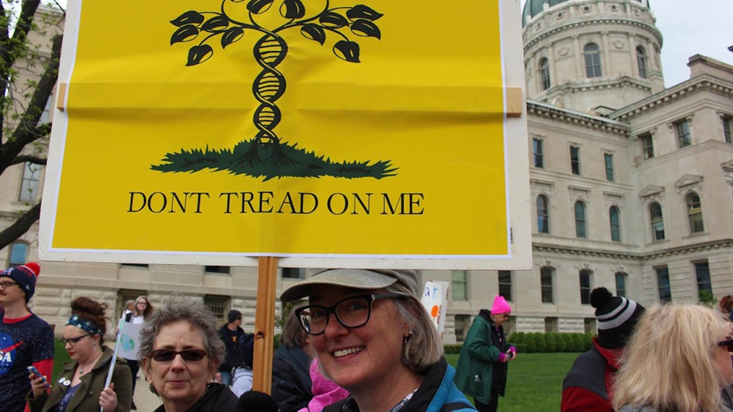 Tami Coleman, 54, came to join an estimated 10,000 people at the March for Science in Indianapolis from her hometown, Anderson, Indiana. Coleman said she’s a New Englander, and is sick of pepole co-opting New England symbols, like the Gasden flag, to further their causes. 