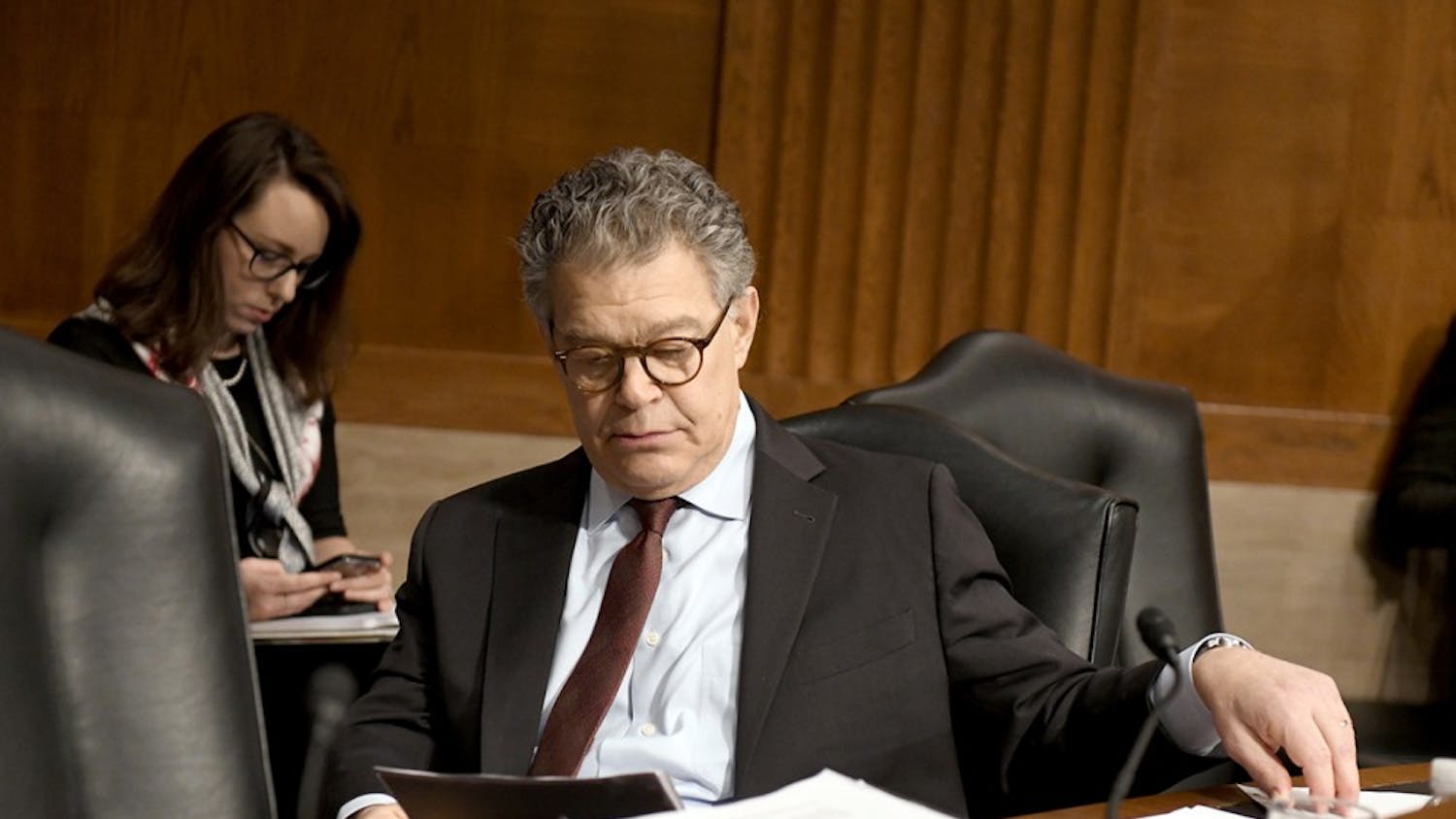 U.S. Sen. Al Franken (D-Minn.) looks over his notes prior to hearing Alex M. Azar II testify before the Senate Committee on Health, Education, Labor and Pensions on his nomination to be Secretary of Health and Human Services on Wednesday, Nov. 29 on Capitol Hill in Washington, D.C. A series of Senate Democratic women issued calls for Franken to resign that morning.