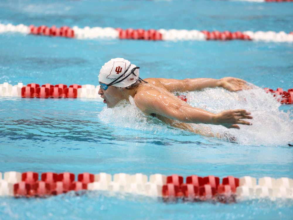 Freshman Alejandro Kincaid participates in the men&#x27;s 200 fly Dec. 2, 2022, in the Student Recreational Sports Center. Kincaid placed sixth in the event. 
