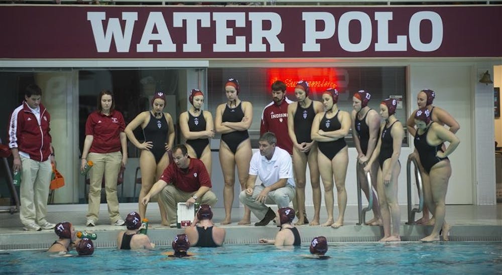The IU Women's Water Polo team meets poolside during their game against Long Beach State on Feb. 23, 2013 at the Counsilman-Billingsly Aquatic Center.