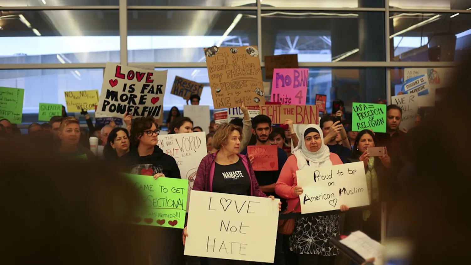 Protestors of the Trump Administration's proposed travel ban and construction of a border along the Mexican U.S. border demonstrate at the Indianapolis International Airport Jan. 29th, 2017. The nonviolent protests featured a series of speakers, including Indiana State Senator Joe Donelly, that encouraged the crowd to remain united and to continue to work for social justice.