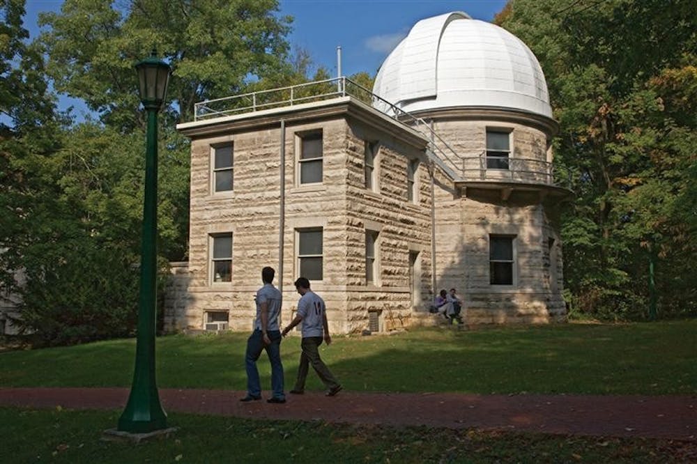 Walkers pass the Kirkwood Observatory on Wednesday, Oct. 17. The observatory hosts free public viewings on Wednesday evenings March through November weather permitting.