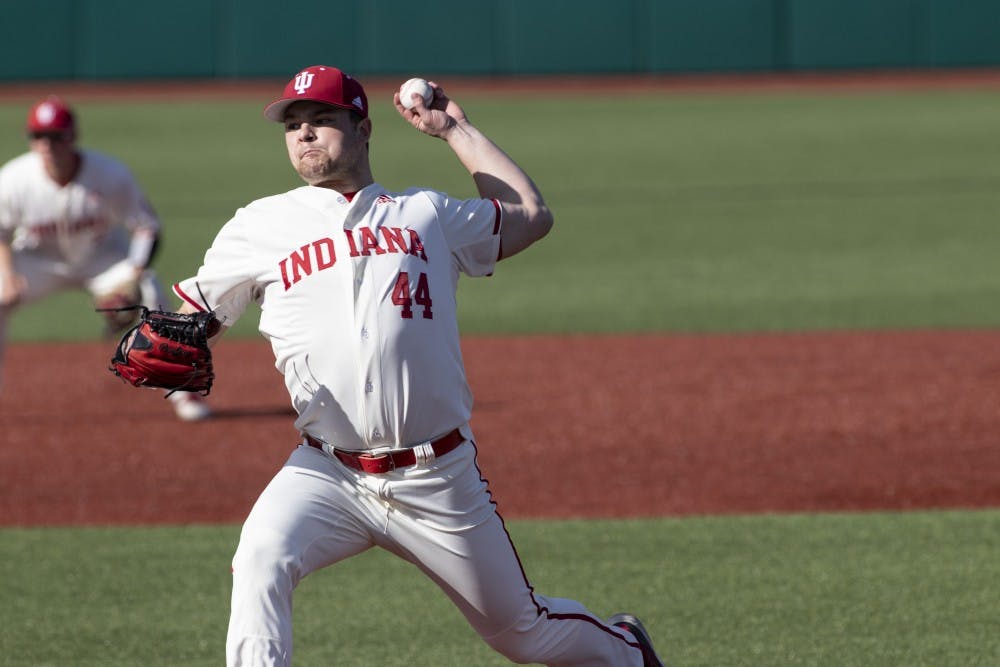 <p>Junior left-handed pitcher Cam Beauchamp sends the ball to the plate March 27 at Bart Kaufman Field. IU will play the University of Maryland on March 29-31. </p>