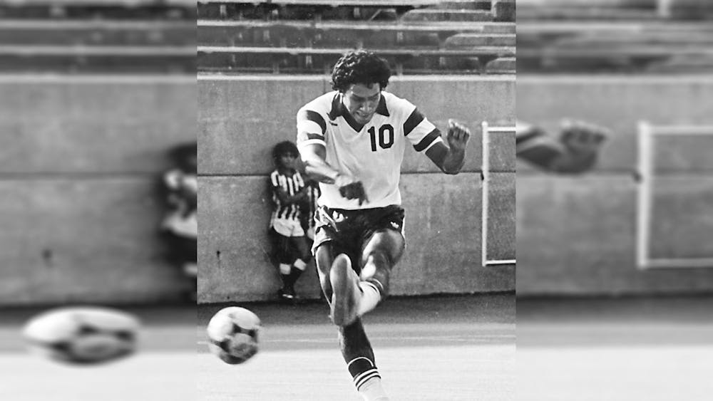 Armando Betancourt kicks a ball for IU men&#x27;s soccer. Betancourt died at the age of 63 on Wednesday in San Pedro Sula, Honduras.