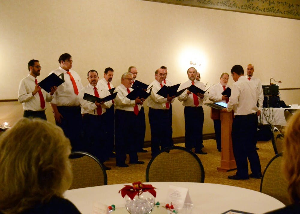 <p>The Quarryland Men's Chorus performs at the World AIDS Day ceremony of remembrance in 2017. The 12th annual ceremony was presented Thursday evening by the Community AIDS Action Group of South Central Indiana.</p>