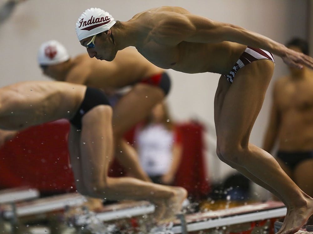 IU junior freestyle and backstroke swimmer Ali Khalafalla leaps into the pool for the 200-yard medley relay against Louisville on Friday, Jan. 27, 2017. Khalafalla will represent Team Egypt in the 50 freestyle on July 28-29 at the 2017 FINA World Championships in Budapest, Hungary.