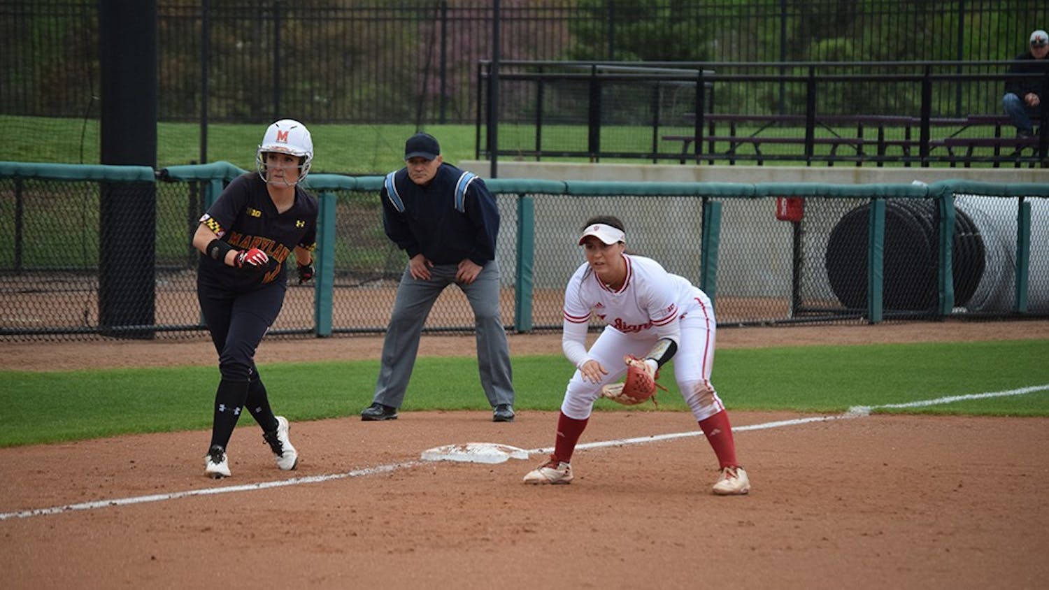 Freshman utility player Katie Lacefield covers the left side of the infield while a Maryland player takes a lead off third base on Friday, April 21, 2017. The Hoosiers defeated the Terrapins in all three games in Bloomington.