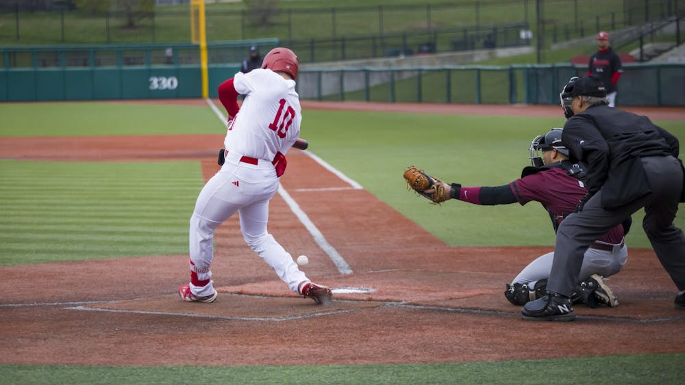 Redshirt junior Morgan Colopy hits a ground ball March 10, 2023, at Bart Kaufman Field. Indiana beat Morehead State 6-5 on Wednesday.