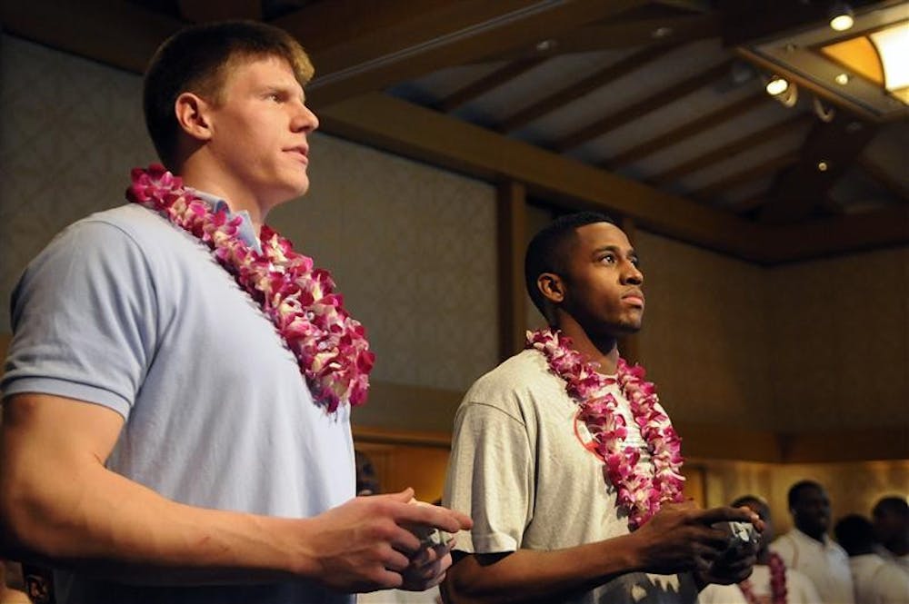 IU junior guard Devan Dumes, right, plays Notre Dame junior forward Luke Harangody in EA SPORTS NCAA Basketball '09 during a players party on Saturday night in Lahaina, Hawaii. The teams will meet in the first round of the Maui Invitational on Monday afternoon.